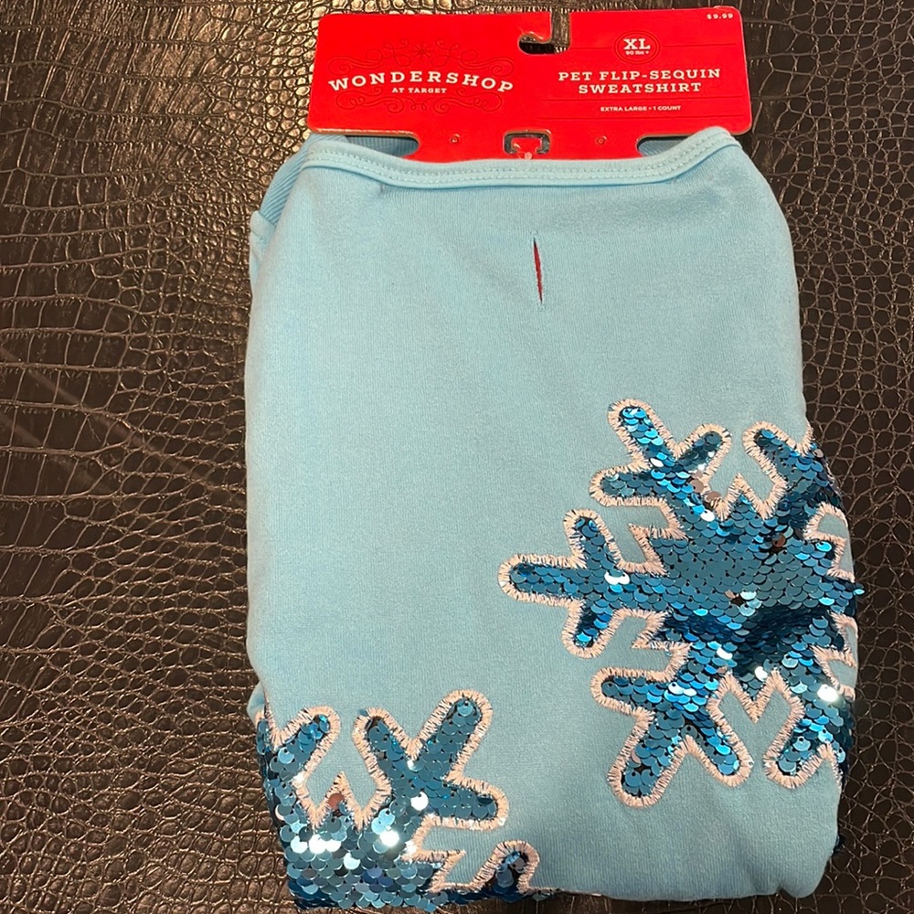 This is a blue with sequent snowflakes pet sweatshirt